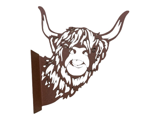 Rustic Highlander looking around the corner sign